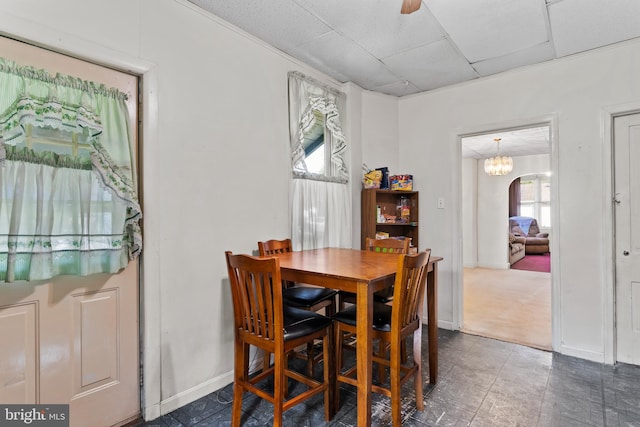 121 Spruce St, Carlisle, PA 17013 - dining area with a drop ceiling, arched walkways, and a chandelier