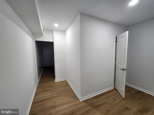 1703 Baker St, Baltimore, MD 21217 - hallway with wood finished floors and recessed lighting