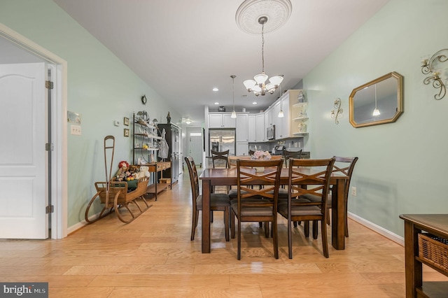 147 Candor Ln, Dover, DE 19901 - dining room featuring light wood-style floors, a chandelier, and recessed lighting