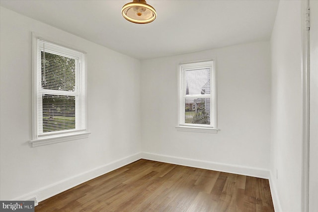 522 E Simpson St, Mechanicsburg, PA 17055 - unfurnished room featuring baseboards and wood finished floors