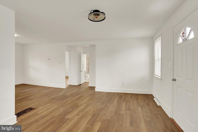 522 E Simpson St, Mechanicsburg, PA 17055 - entrance foyer featuring wood finished floors and baseboards