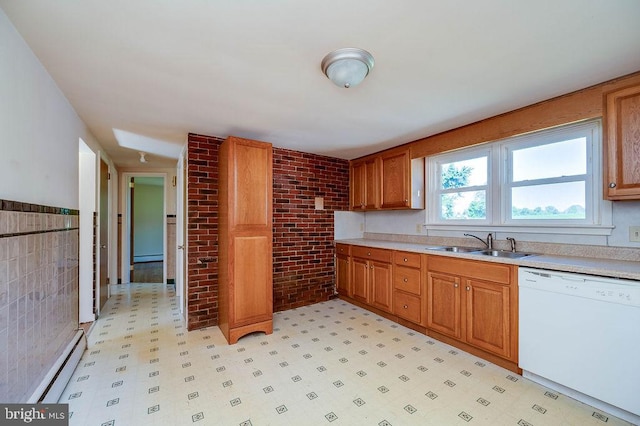 416 Colebrookdale Rd, Boyertown, PA 19512 - kitchen with dishwasher, brick wall, baseboard heating, light floors, and light countertops
