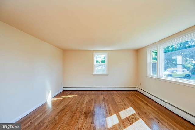416 Colebrookdale Rd, Boyertown, PA 19512 - empty room with baseboard heating and wood finished floors