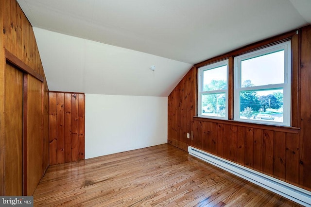 416 Colebrookdale Rd, Boyertown, PA 19512 - additional living space with baseboard heating, lofted ceiling, light wood-style flooring, and wooden walls