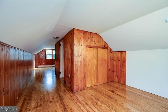 416 Colebrookdale Rd, Boyertown, PA 19512 - additional living space featuring baseboard heating, wood walls, wood finished floors, and lofted ceiling