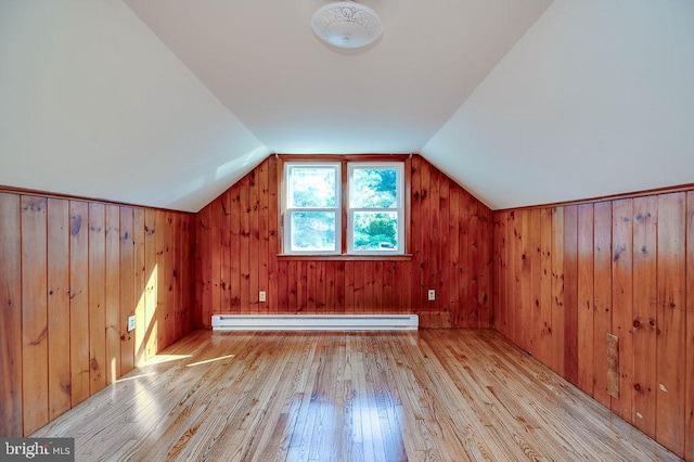 416 Colebrookdale Rd, Boyertown, PA 19512 - additional living space with baseboard heating, wood finished floors, vaulted ceiling, and wood walls