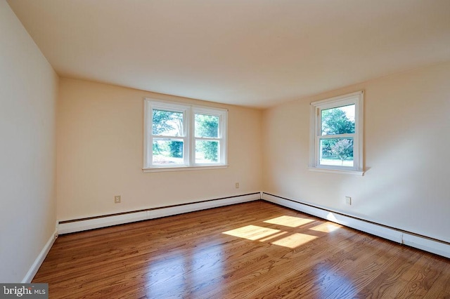 416 Colebrookdale Rd, Boyertown, PA 19512 - spare room featuring a baseboard radiator and wood finished floors