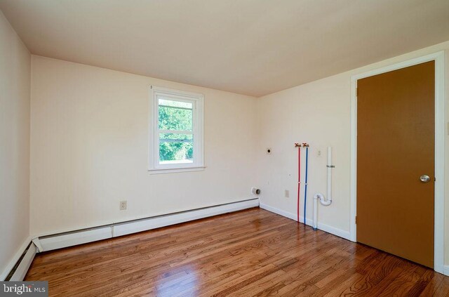 416 Colebrookdale Rd, Boyertown, PA 19512 - unfurnished bedroom featuring a baseboard radiator and wood finished floors