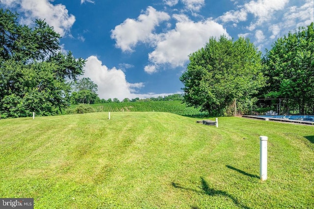 416 Colebrookdale Rd, Boyertown, PA 19512 - view of green lawn with an outdoor pool and a rural view