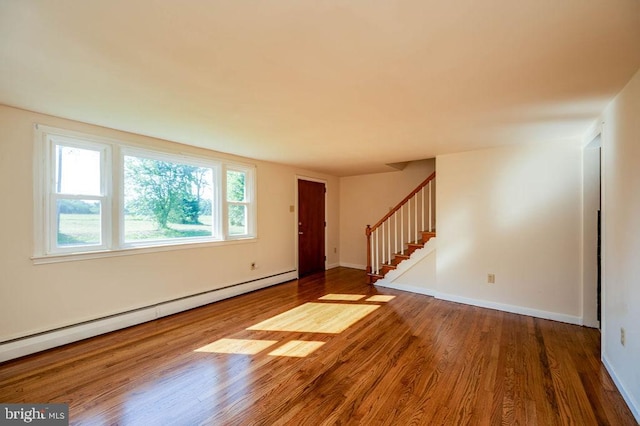 416 Colebrookdale Rd, Boyertown, PA 19512 - foyer entrance featuring a baseboard radiator, wood finished floors, and stairway