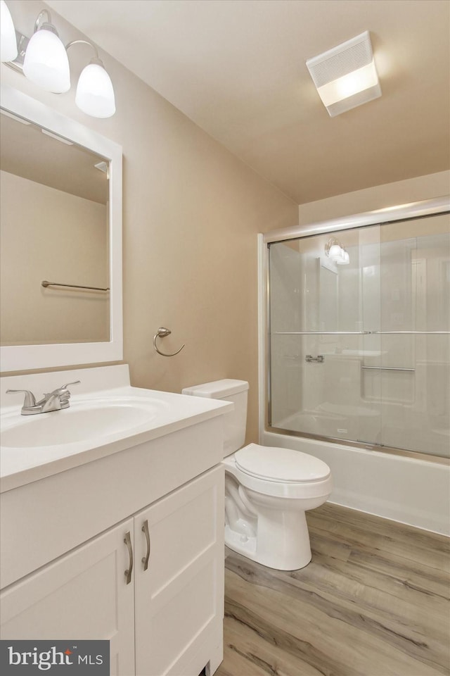 4953 Lincolnwood Dr, York, PA 17408 - bathroom with vanity, wood finished floors, and combined bath / shower with glass door