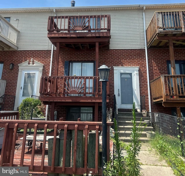 18 Villa Capri Cir, Baltimore, MD 21221 - back of property with brick siding and a balcony