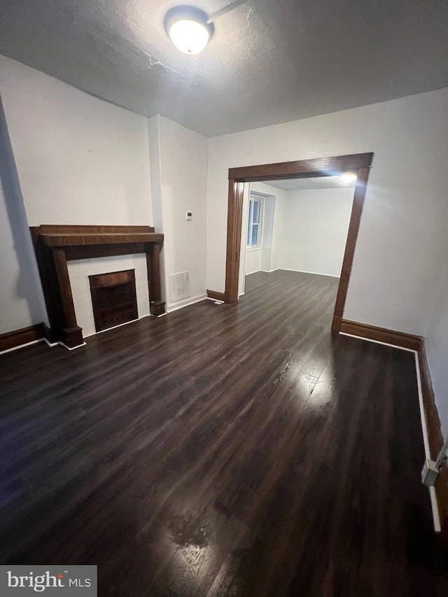 408 Broadway St, Cumberland, MD 21502 - unfurnished living room with wood finished floors and a fireplace