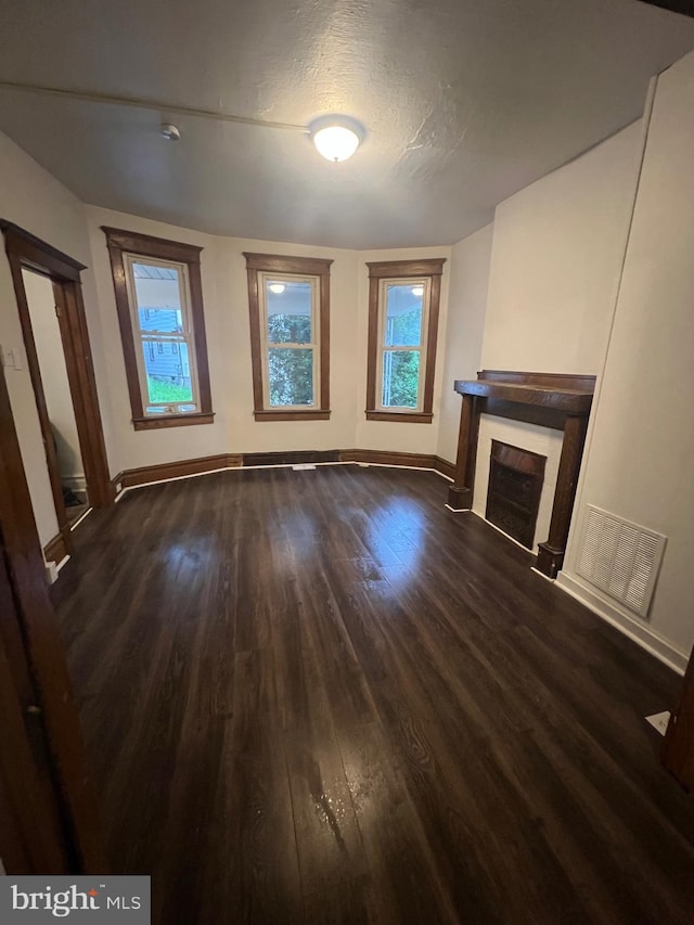 408 Broadway St, Cumberland, MD 21502 - unfurnished living room with wood finished floors and a fireplace