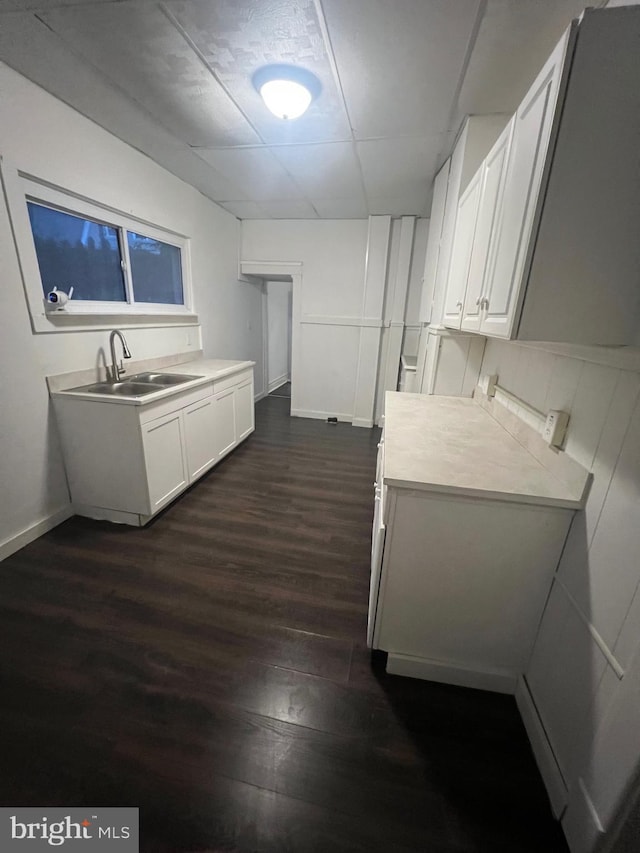 408 Broadway St, Cumberland, MD 21502 - kitchen with dark wood-style flooring, light countertops, and white cabinetry