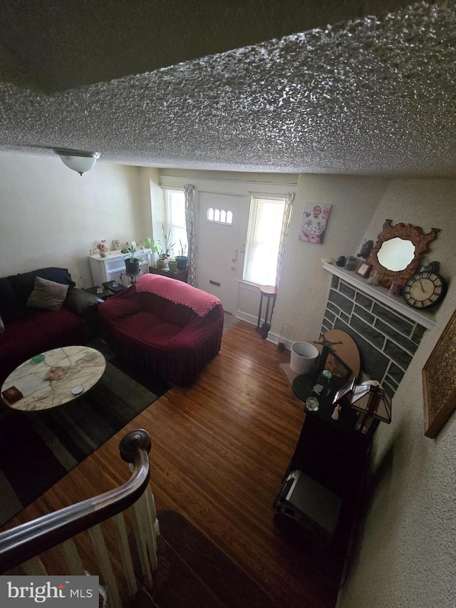 306 E Queen Ln, Philadelphia, PA 19144 - living area with wood finished floors and a textured ceiling