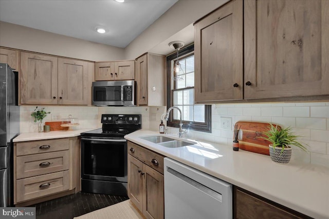 208 Queens Gate Rd, Lititz, PA 17543 - kitchen featuring white dishwasher, black electric range oven, stainless steel microwave, freestanding refrigerator, and backsplash