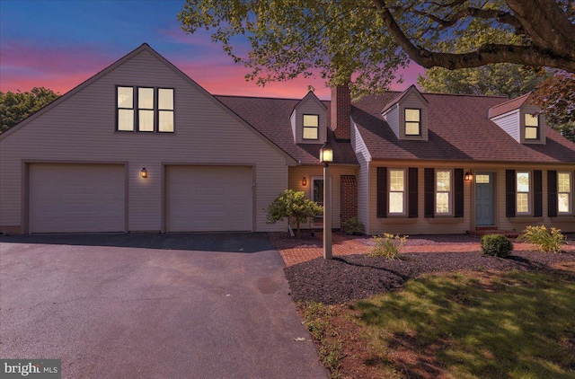 208 Queens Gate Rd, Lititz, PA 17543 - view of front of house with a garage, driveway, and a chimney