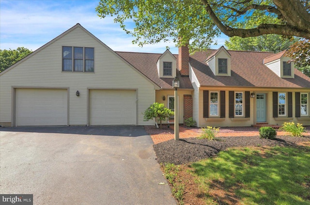 208 Queens Gate Rd, Lititz, PA 17543 - cape cod-style house with asphalt driveway, a chimney, and a shingled roof