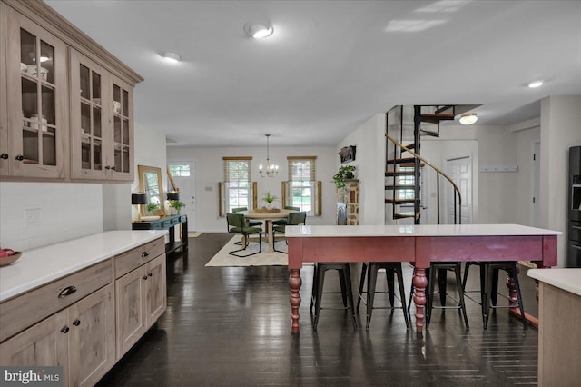 208 Queens Gate Rd, Lititz, PA 17543 - dining space with stairway, dark wood-style floors, and a chandelier