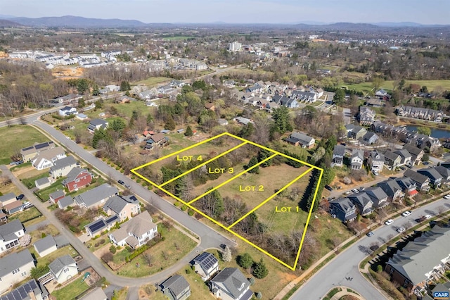 3 Rothwell Ln Lot 3, Crozet, VA 22932 - aerial perspective of suburban area with property parcel outlined and a mountainous background
