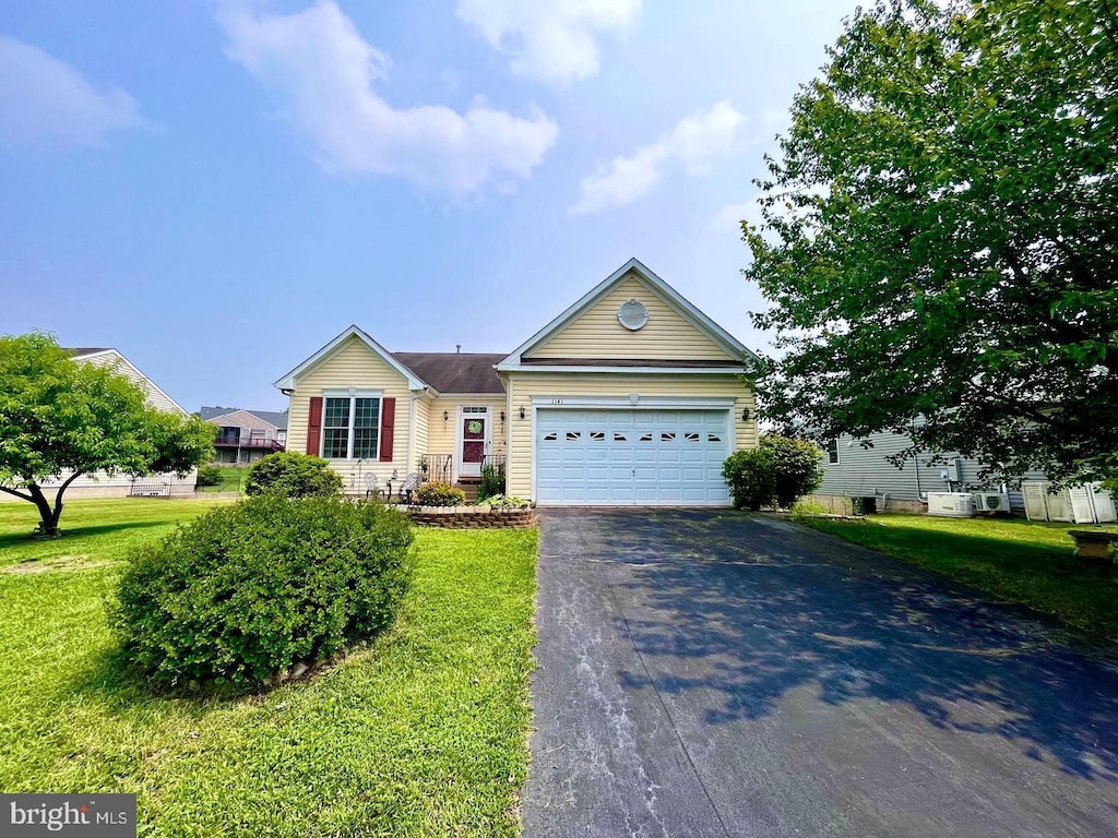 1141 Virginia Ave, Culpeper, VA 22701 - view of front of property with driveway, a garage, and a front yard