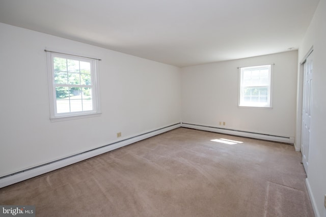 2 Broadale Rd, Doylestown, PA 18901 - unfurnished bedroom with multiple windows, carpet floors, and a baseboard heating unit
