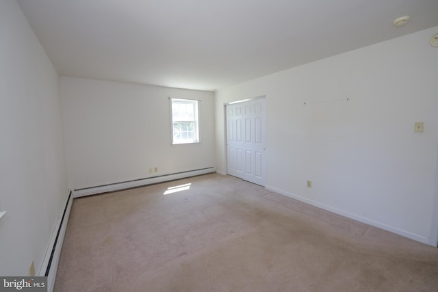 2 Broadale Rd, Doylestown, PA 18901 - unfurnished room with a baseboard heating unit, a smoke detector, and carpet