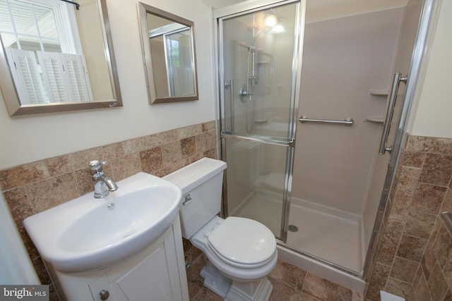 2 Broadale Rd, Doylestown, PA 18901 - full bath with tile walls, a stall shower, a wainscoted wall, stone tile floors, and vanity