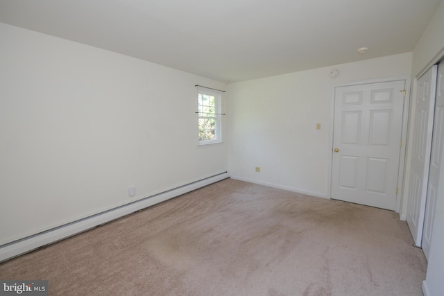 2 Broadale Rd, Doylestown, PA 18901 - empty room with baseboard heating, carpet, and a smoke detector