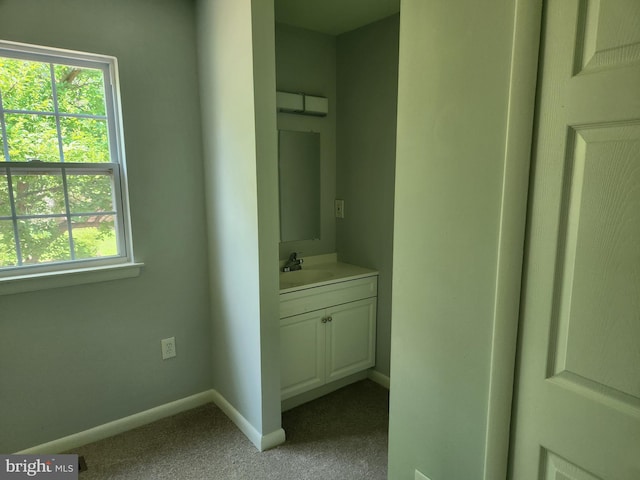 14273 Princedale Dr, Woodbridge, VA 22193 - bathroom with vanity and baseboards
