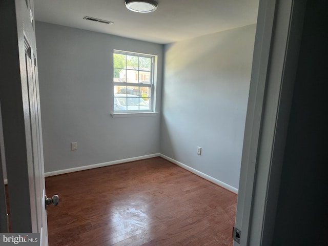 14273 Princedale Dr, Woodbridge, VA 22193 - unfurnished room featuring wood finished floors and baseboards
