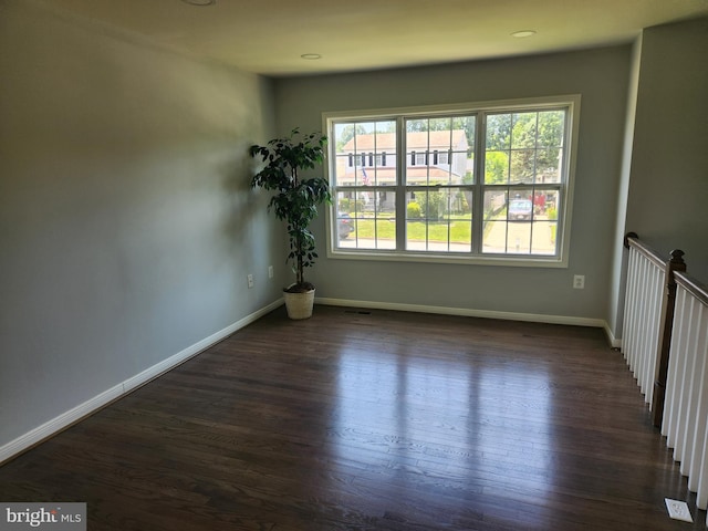 14273 Princedale Dr, Woodbridge, VA 22193 - unfurnished room featuring dark wood-style flooring and baseboards