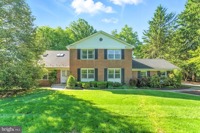508 Vierling Dr, Silver Spring, MD 20904 - view of front facade with brick siding and a front lawn