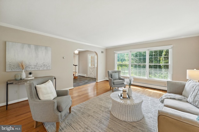 508 Vierling Dr, Silver Spring, MD 20904 - living room with a baseboard radiator, arched walkways, ornamental molding, wood finished floors, and baseboard heating