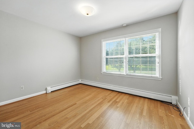 508 Vierling Dr, Silver Spring, MD 20904 - unfurnished room featuring light wood finished floors and a baseboard radiator