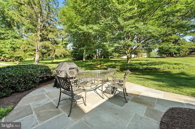 508 Vierling Dr, Silver Spring, MD 20904 - view of patio featuring outdoor dining area and view of scattered trees