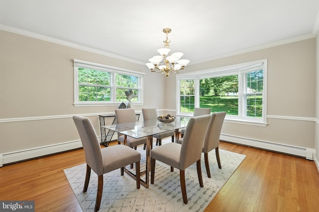 508 Vierling Dr, Silver Spring, MD 20904 - dining area featuring a baseboard radiator, a chandelier, crown molding, and light wood-type flooring