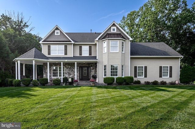 12 Deerpath Ln, Columbus, NJ 08022 - view of front of home with a front lawn, covered porch, and roof with shingles