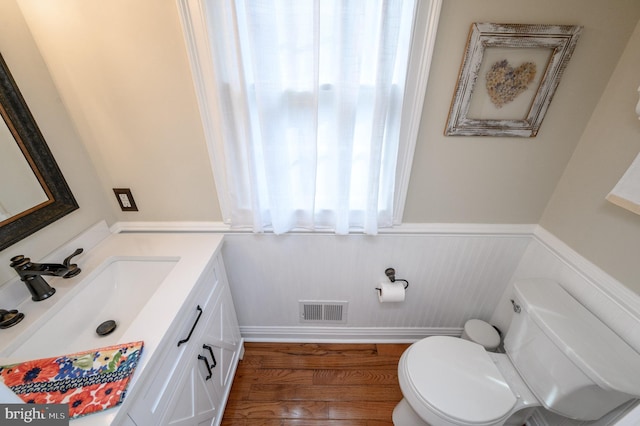 12 Deerpath Ln, Columbus, NJ 08022 - half bath featuring healthy amount of natural light, vanity, and wood finished floors