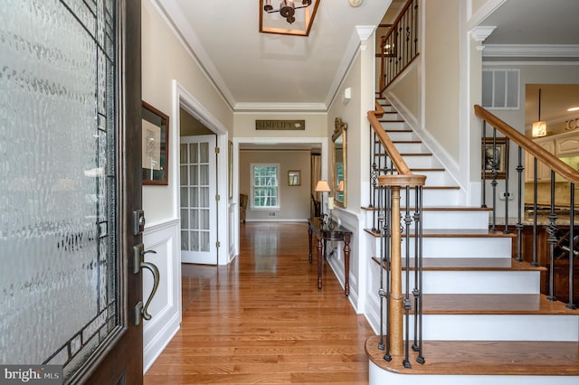 12 Deerpath Ln, Columbus, NJ 08022 - entryway featuring ornamental molding, stairway, and wood finished floors