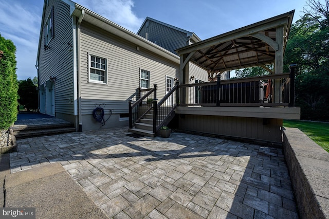 12 Deerpath Ln, Columbus, NJ 08022 - back of property featuring a gazebo, a patio area, and a wooden deck