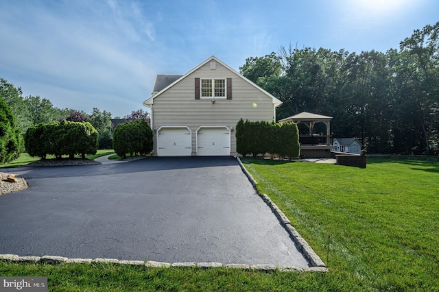 12 Deerpath Ln, Columbus, NJ 08022 - view of property exterior with a gazebo, driveway, an attached garage, and a lawn