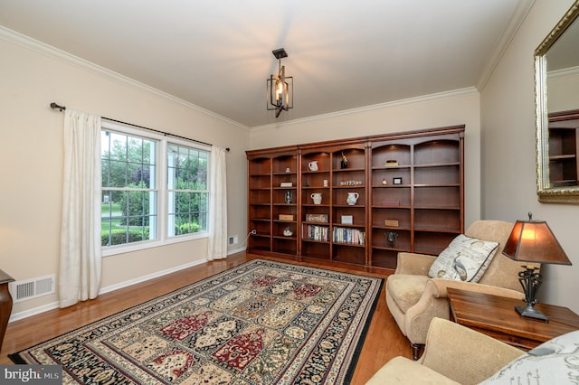 12 Deerpath Ln, Columbus, NJ 08022 - sitting room with wood finished floors and crown molding