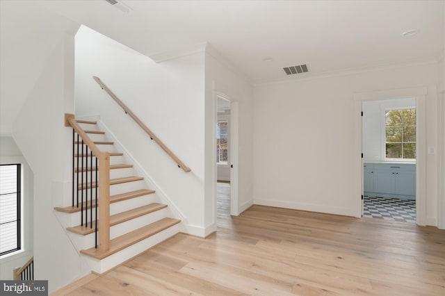 2724 N Dinwiddie St, Arlington, VA 22207 - staircase featuring ornamental molding and wood finished floors
