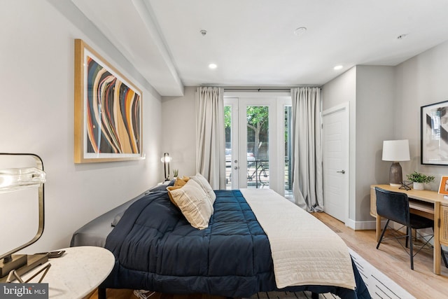 614 I St NE Unit 1, Washington, DC 20002 - bedroom with access to exterior, light wood-style flooring, and recessed lighting