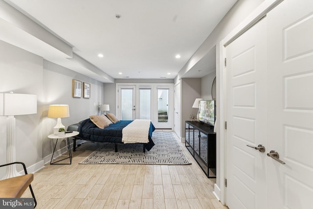 614 I St NE Unit 1, Washington, DC 20002 - bedroom featuring access to exterior, light wood-type flooring, and recessed lighting