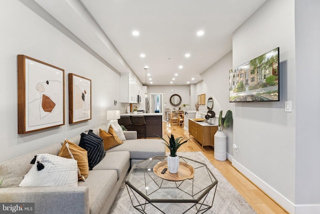 614 I St NE Unit 1, Washington, DC 20002 - living room with light wood-style flooring and recessed lighting