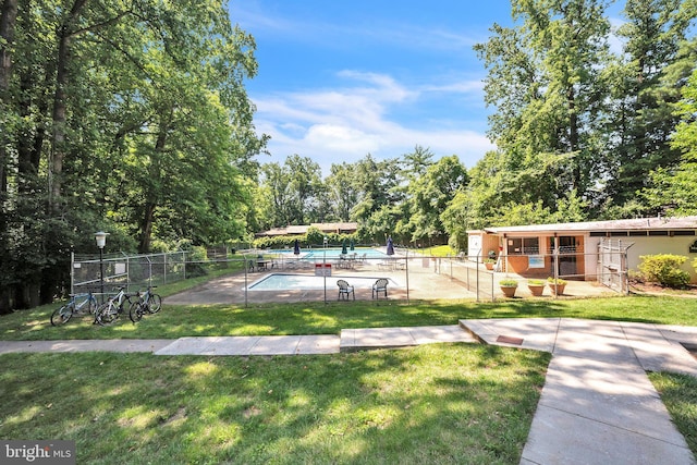 4939 Americana Dr Unit 106, Annandale, VA 22003 - view of yard featuring view of wooded area