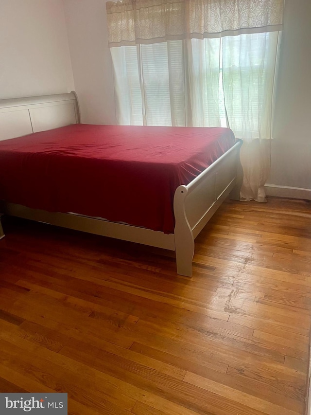 743 E Madison St, Lancaster, PA 17602 - bedroom with hardwood / wood-style flooring and multiple windows
